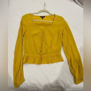 Express Cut Out Long Sleeve Gold Top